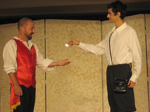 "Lindoro" gives Figaro a coin