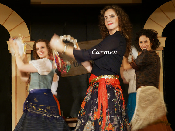 Carmen, Frasquita, and Mercedes dancing
