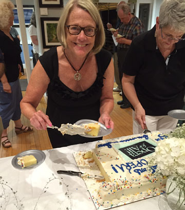 Charlotte Brumit cuts the cake